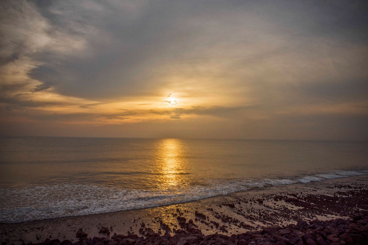 Serene Somnath Beach Rocky Shoreline Sunset